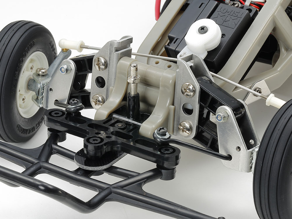 Tamiya official front-mechanism detail: the steering, radius arms and spring arrangement explain this unusual classic chassis.