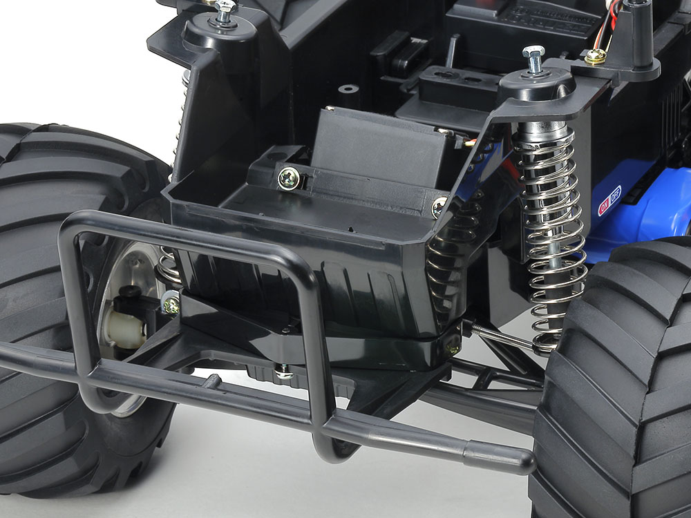 Tamiya official rear mechanism detail: the rolling axle and coil-spring arrangement, with plated damper cylinders.